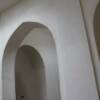 Natural untinted plaster finish on arches